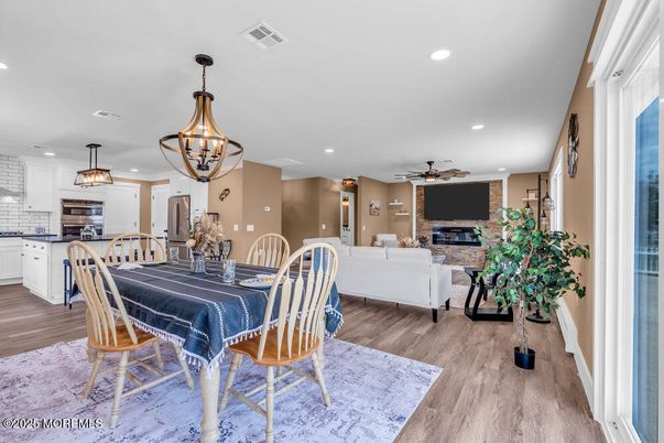 Chandelier, Dining room, Interior, Kitchen, Living room, Pendant Lights, Recessed Lighting, Wood Texture Flooring