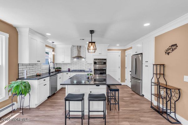 Interior, Kitchen, Pendant Lights, Recessed Lighting, Stainless Steel Appliances, Wood Texture Flooring