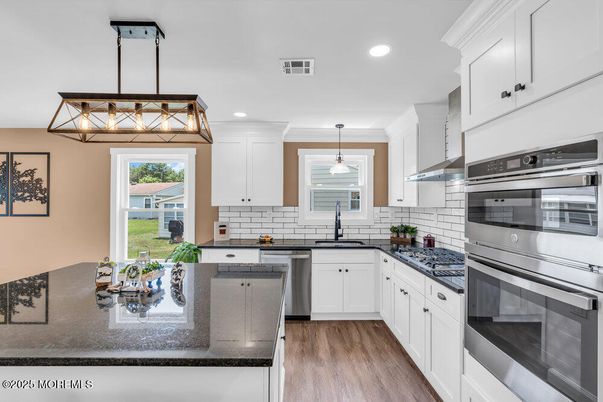 Interior, Kitchen, Pendant Lights, Recessed Lighting, Stainless Steel Appliances, Wood Texture Flooring