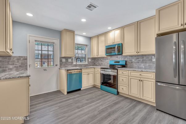 Interior, Kitchen, Recessed Lighting, Stainless Steel Appliances, Wood Texture Flooring