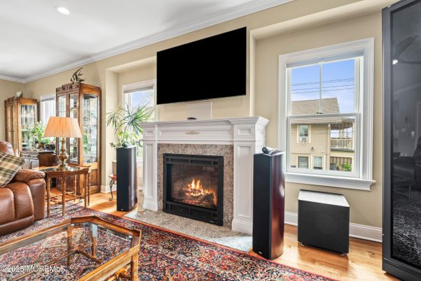 Fireplace, Interior, Living room, Recessed Lighting, Wood Texture Flooring