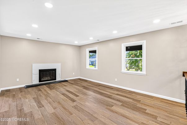 Empty room, Fireplace, Interior, Recessed Lighting, Wood Texture Flooring