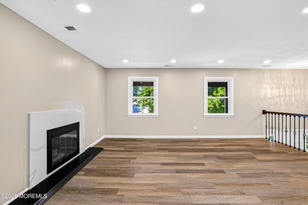 Empty room, Fireplace, Interior, Recessed Lighting, Wood Texture Flooring