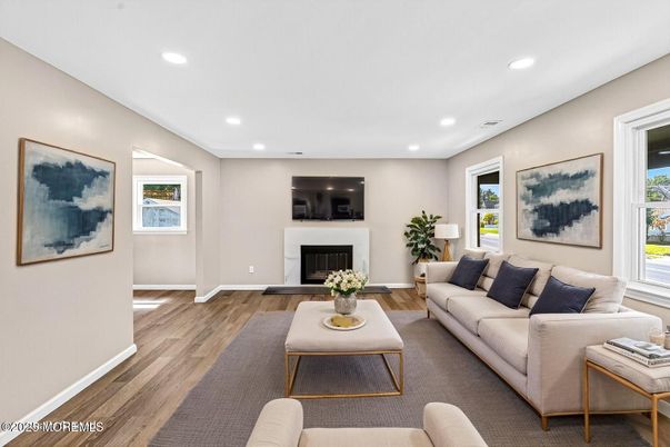 Fireplace, Interior, Living room, Recessed Lighting, Wood Texture Flooring