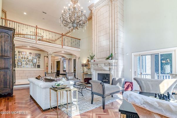 Chandelier, Fireplace, Interior, Living room, Recessed Lighting, Wood Texture Flooring