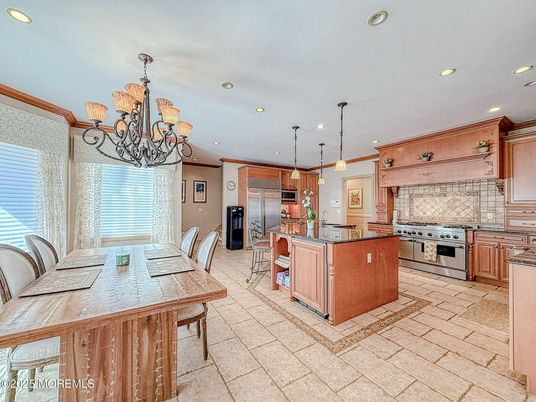 Chandelier, Dining room, Interior, Kitchen, Pendant Lights, Recessed Lighting, Stainless Steel Appliances