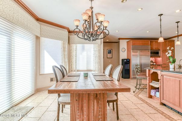 Chandelier, Dining room, Interior, Kitchen, Pendant Lights, Recessed Lighting, Stainless Steel Appliances
