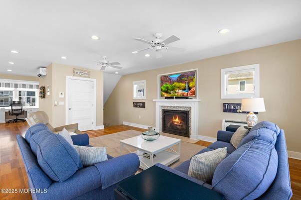 Fireplace, Interior, Living room, Recessed Lighting, Wood Texture Flooring