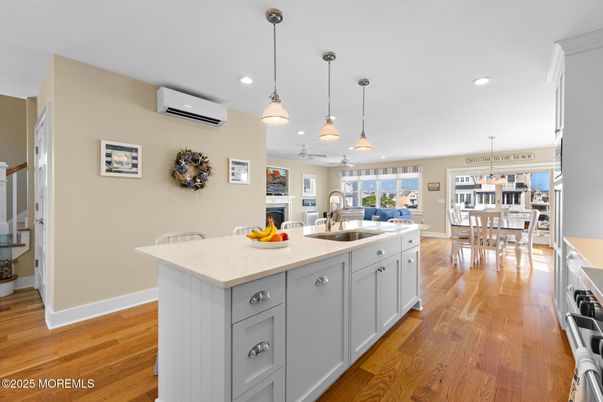 Dining room, Fireplace, Interior, Kitchen, Pendant Lights, Recessed Lighting, Wood Texture Flooring