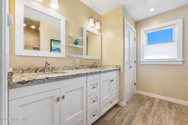 Bathroom, Dual Sink Vanities, Interior, Recessed Lighting, Wood Texture Flooring