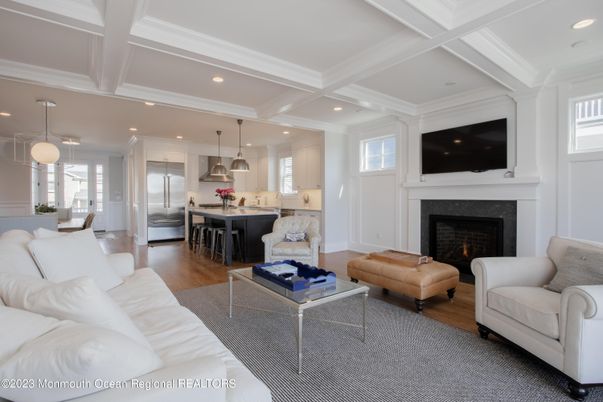 Fireplace, Interior, Kitchen, Living room, Pendant Lights, Recessed Lighting, Stainless Steel Appliances, Wood Texture Flooring