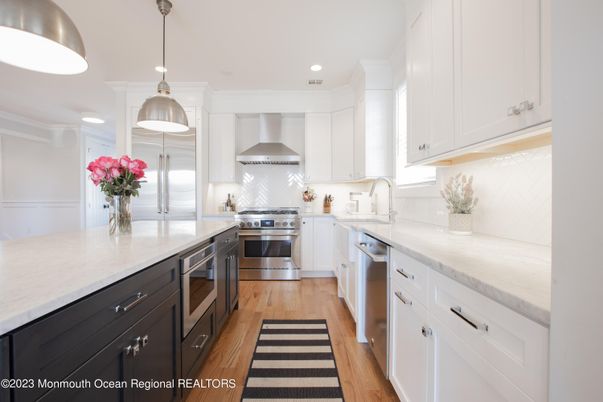 Interior, Kitchen, Pendant Lights, Recessed Lighting, Stainless Steel Appliances, Wood Texture Flooring