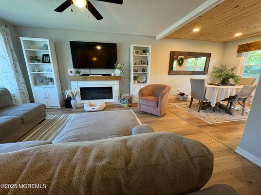 Dining room, Fireplace, Interior, Living room, Recessed Lighting, Wooden Ceilings, Wood Texture Flooring