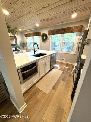 Interior, Kitchen, Recessed Lighting, Stainless Steel Appliances, Wooden Ceilings, Wood Texture Flooring