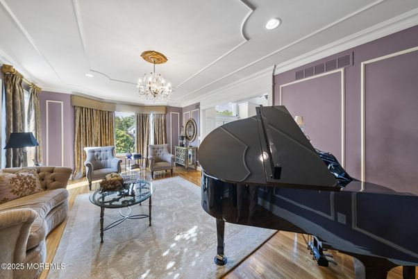 Chandelier, Interior, Living room, Piano, Recessed Lighting, Wood Texture Flooring