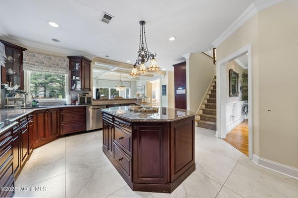 Chandelier, Interior, Kitchen, Marble, Pendant Lights, Recessed Lighting, Stainless Steel Appliances, Wood Texture Flooring