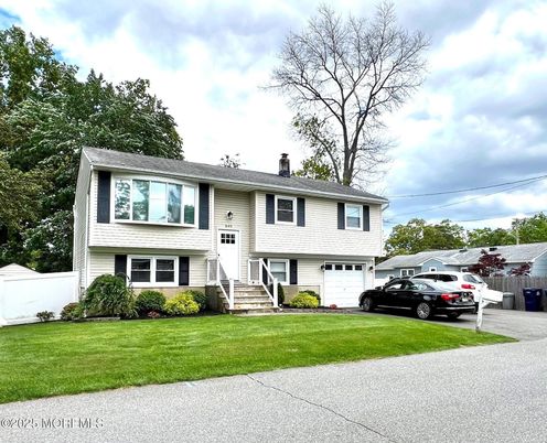 Attached, Exterior, Facade, Raised Ranch