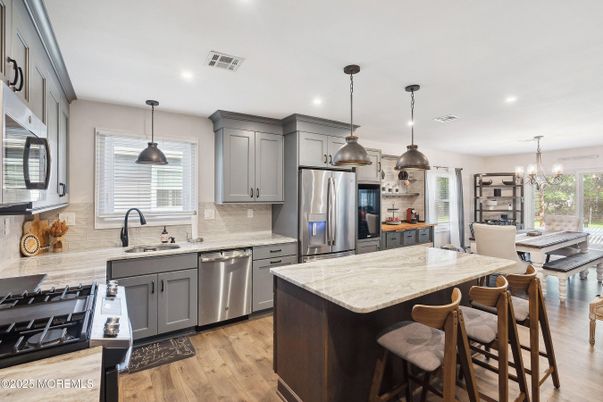 Interior, Kitchen, Pendant Lights, Recessed Lighting, Stainless Steel Appliances, Wood Texture Flooring