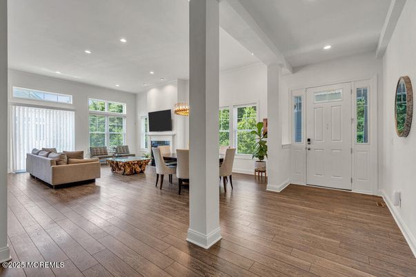 Chandelier, Dining room, Fireplace, Interior, Living room, Recessed Lighting, Wood Texture Flooring