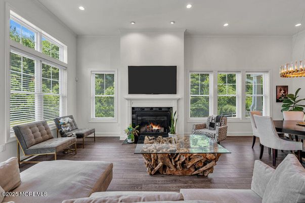 Dining room, Fireplace, Interior, Living room, Pendant Lights, Recessed Lighting, Wood Texture Flooring