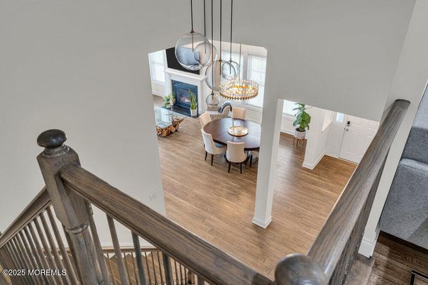 Chandelier, Dining room, Fireplace, Interior, Pendant Lights, Wood Texture Flooring