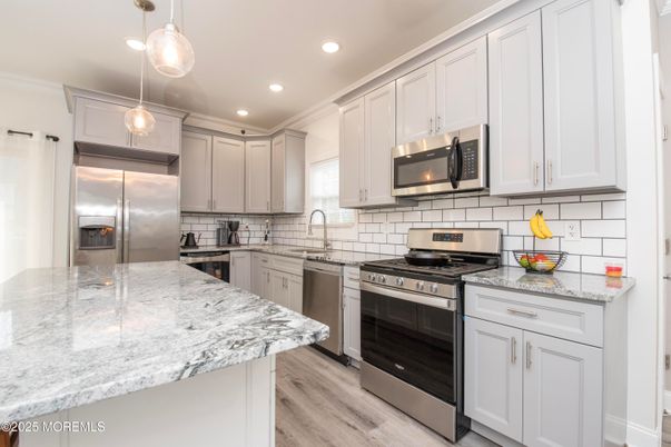Interior, Kitchen, Pendant Lights, Recessed Lighting, Stainless Steel Appliances, Wood Texture Flooring