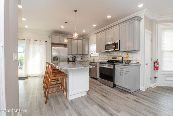 Interior, Kitchen, Pendant Lights, Recessed Lighting, Stainless Steel Appliances, Wood Texture Flooring