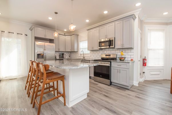 Interior, Kitchen, Pendant Lights, Recessed Lighting, Stainless Steel Appliances, Wood Texture Flooring