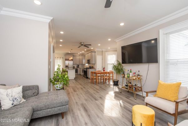 Dining room, Interior, Kitchen, Living room, Recessed Lighting, Stainless Steel Appliances, Wood Texture Flooring