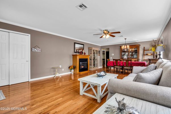 Chandelier, Dining room, Fireplace, Interior, Living room, Wood Texture Flooring