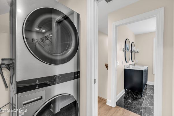 Bathroom, Interior, Marble, Utility Closets, Washer, Wood Texture Flooring
