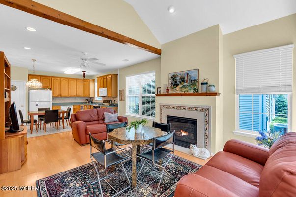 Dining room, Fireplace, Interior, Living room, Pendant Lights, Recessed Lighting, Wooden Beams, Wood Texture Flooring
