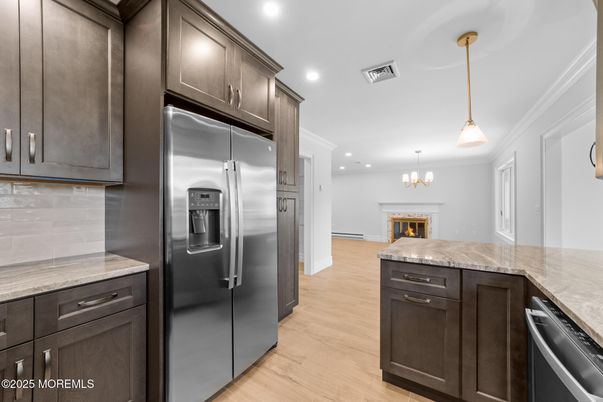 Chandelier, Interior, Kitchen, Pendant Lights, Recessed Lighting, Stainless Steel Appliances, Wood Texture Flooring