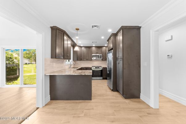 Interior, Kitchen, Pendant Lights, Recessed Lighting, Stainless Steel Appliances, Wood Texture Flooring