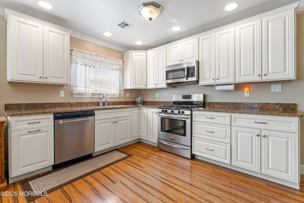 Interior, Kitchen, Recessed Lighting, Stainless Steel Appliances, Wood Texture Flooring