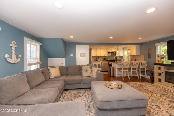 Dining room, Interior, Kitchen, Living room, Pendant Lights, Recessed Lighting, Stainless Steel Appliances, Wood Texture Flooring