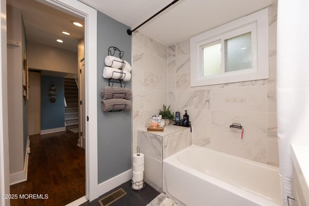 Bathroom, Interior, Marble Walls, Recessed Lighting, Wood Texture Flooring