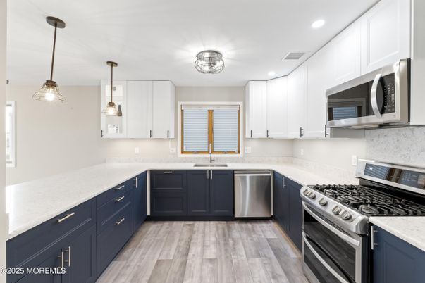 Interior, Kitchen, Pendant Lights, Recessed Lighting, Stainless Steel Appliances, Wood Texture Flooring