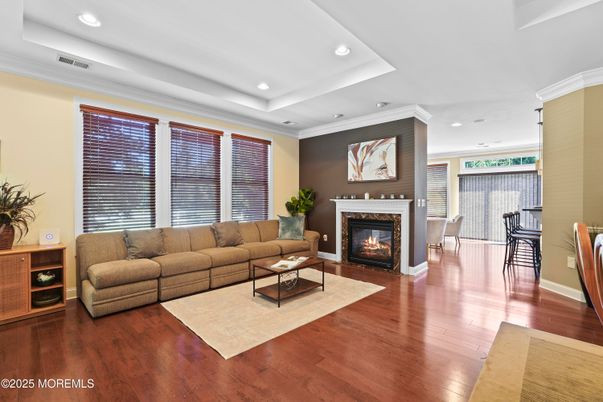 Dining room, Fireplace, Interior, Living room, Recessed Lighting, Wood Texture Flooring