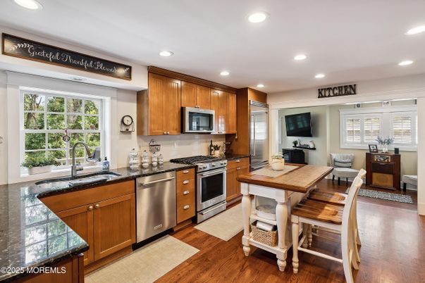 Dining room, Interior, Kitchen, Recessed Lighting, Stainless Steel Appliances, Wood Texture Flooring