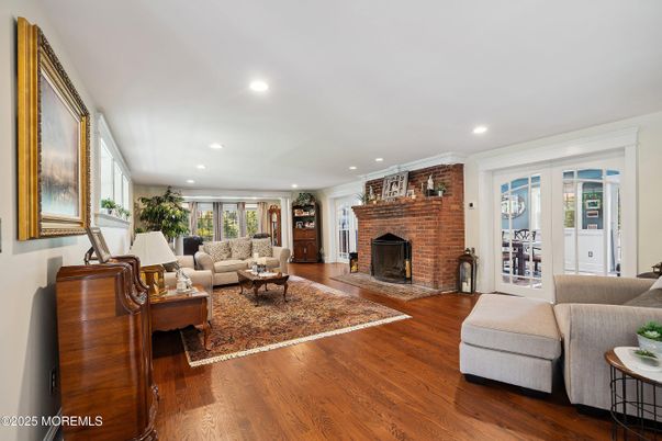 Fireplace, Interior, Living room, Recessed Lighting, Stone Walls, Wood Texture Flooring