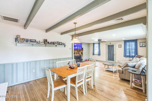 Dining room, Fireplace, Interior, Living room, Pendant Lights, Recessed Lighting, Wood Texture Flooring