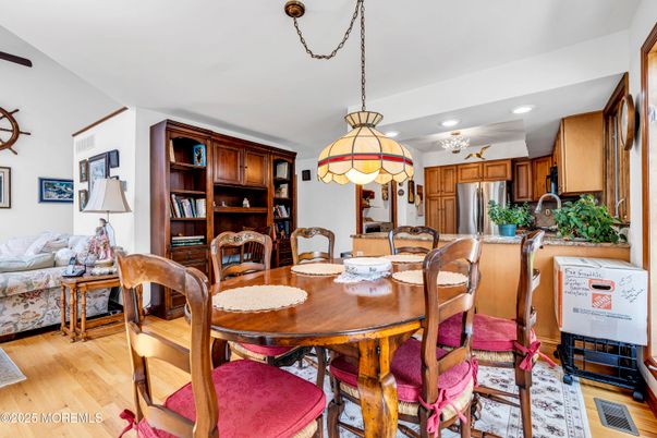Dining room, Interior, Kitchen, Pendant Lights, Recessed Lighting, Stainless Steel Appliances, Wood Texture Flooring
