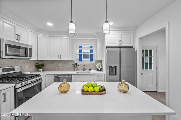 Interior, Kitchen, Pendant Lights, Recessed Lighting, Stainless Steel Appliances, Wood Texture Flooring