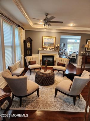 Dining room, Fireplace, Interior, Living room, Recessed Lighting, Wood Texture Flooring
