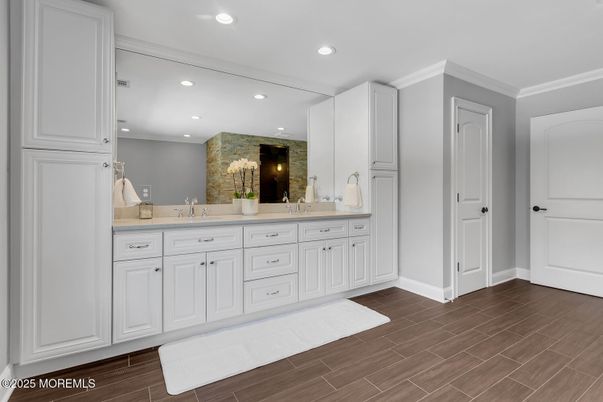Bathroom, Dual Sink Vanities, Interior, Recessed Lighting, Wood Texture Flooring