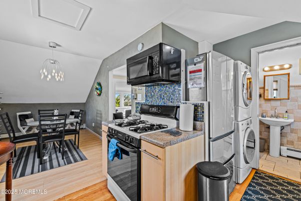 Dining room, Interior, Kitchen, Pendant Lights, Washer, Wood Texture Flooring