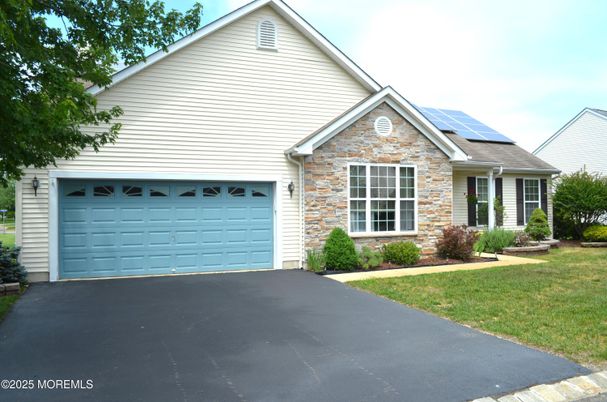 Attached, Exterior, Facade, Solar Panels, Brick Traditional