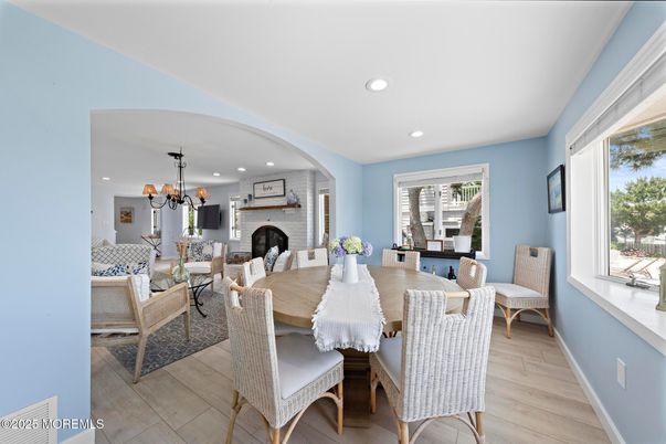 Chandelier, Dining room, Fireplace, Interior, Recessed Lighting, Wood Texture Flooring