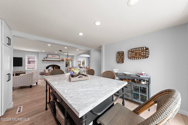Dining room, Interior, Kitchen, Living room, Pendant Lights, Recessed Lighting, Stone Walls, Wood Texture Flooring